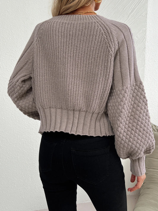 Knitted cardigan with raglan sleeve texture