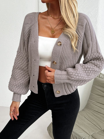 Knitted cardigan with raglan sleeve texture